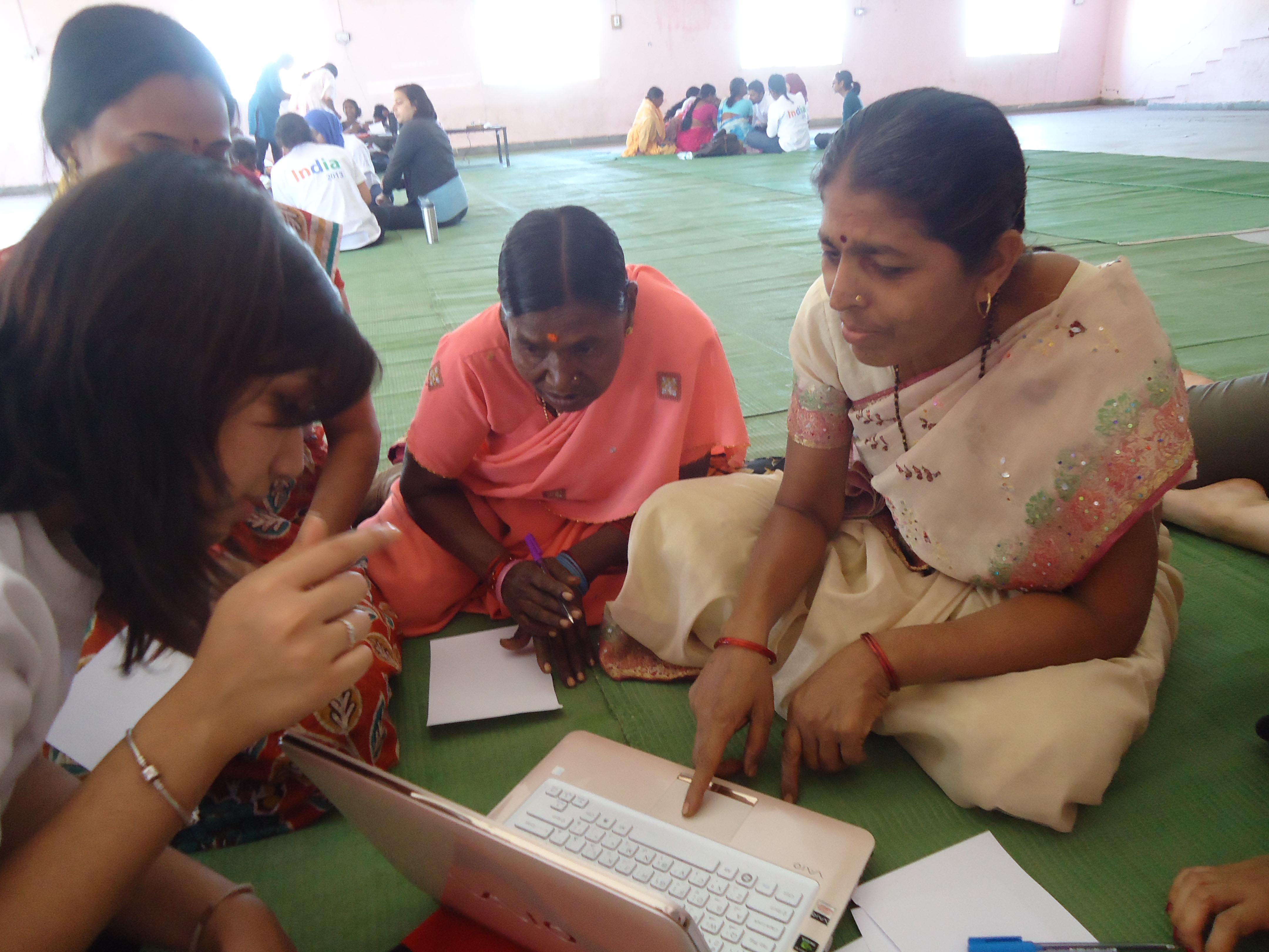 Pushpa with the laptop